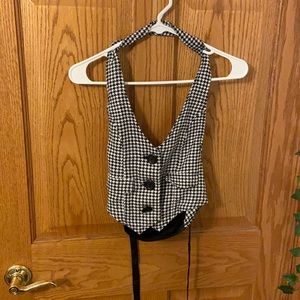 Cropped halter vest with a tie on the back